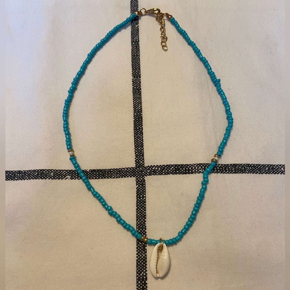 Turquoise Blue Beaded Choker with Puka Shell Pendant